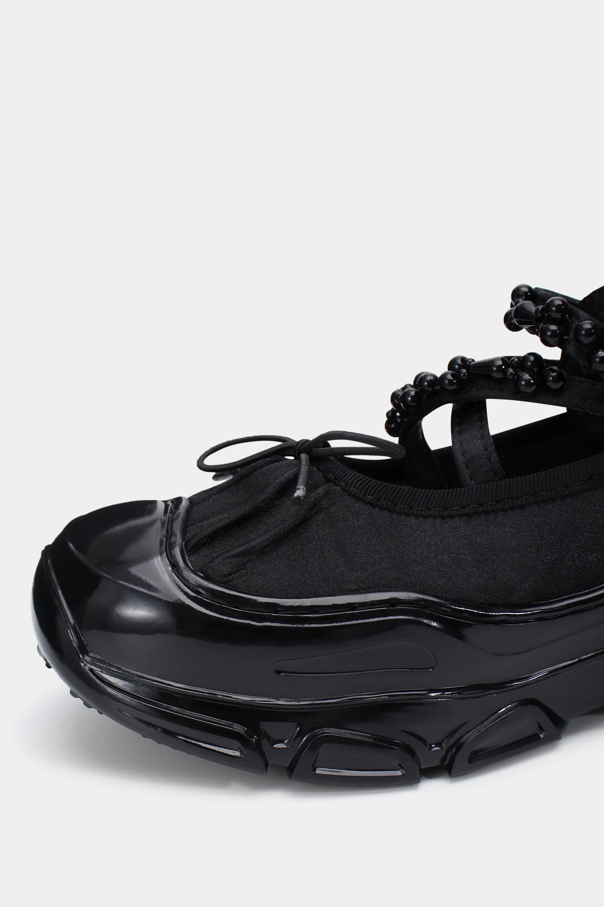 Elegant Black Ballet Sneakers with Pearl Accents for Stylish Comfort